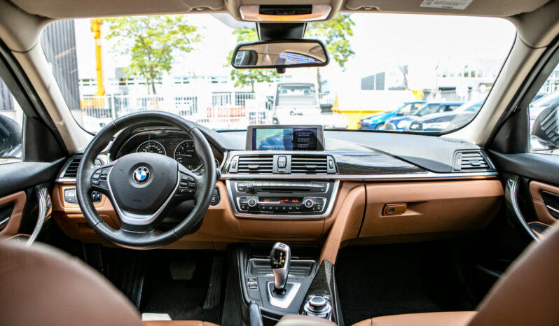 BMW 3-serie 320i High Executive| Navigatie| Head-up display| Cruise control vol